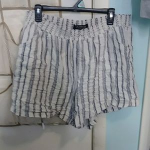 White and blue/grey shorts